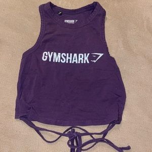 Purple gymshark tank with a wrap around string detail.